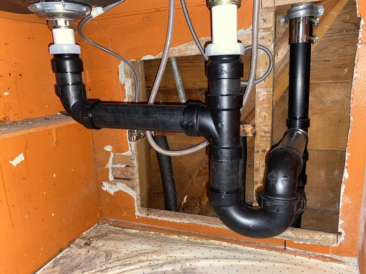 Professional Garbage Disposal Repair equipment and tools on the job in Fort Fairfield